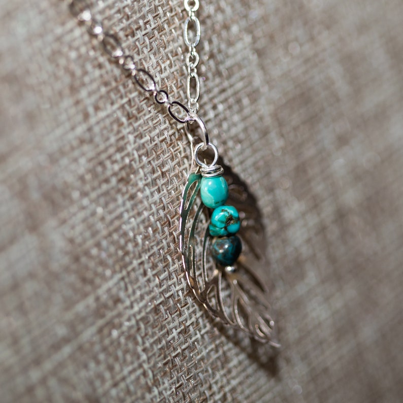 Silver leaf necklace with a turquoise dangle