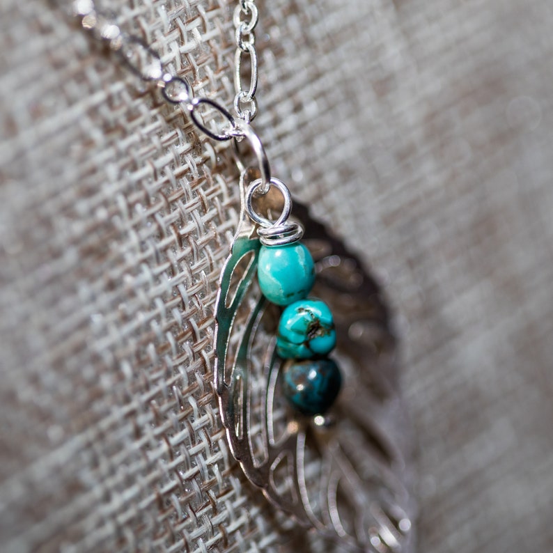 Silver leaf necklace with a turquoise dangle