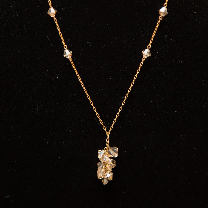 Golden shadow crystal cluster drop necklace image 1