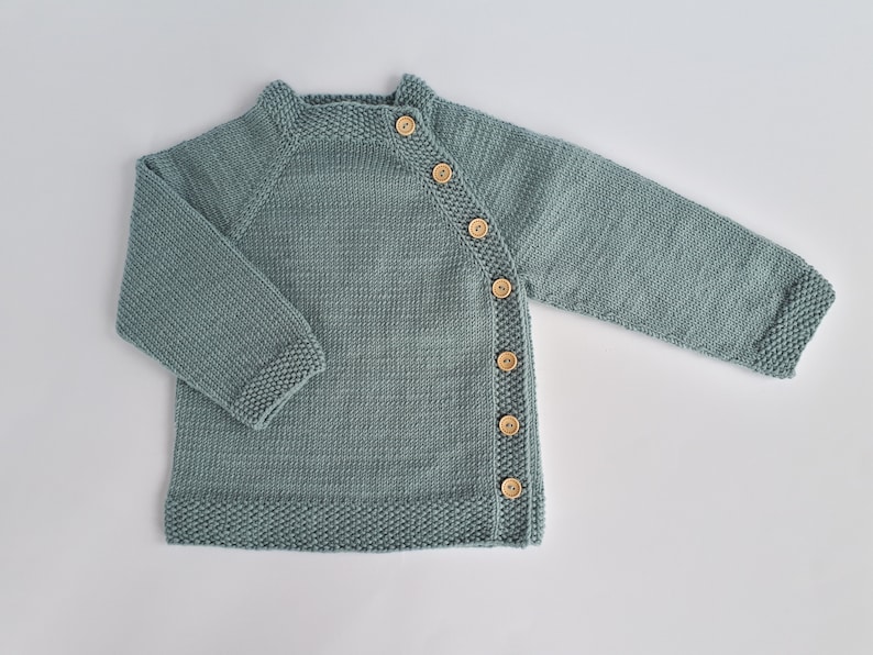 MADE TO ORDER/ Hand knitted side fastened baby sweater/ Merino wool Light greyish green