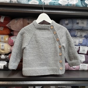 MADE TO ORDER/ Hand knitted side fastened baby sweater/ Merino wool Light grey
