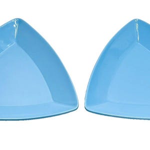 May include: Two light blue, triangular-shaped plates. The plates have a smooth, glossy finish and a slightly raised edge. The plates are identical in shape and size, and are set against a white background.