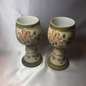 A Pair of Mettlach PUG Goblets; 2954; cherubs; Villeroy and Boch, mettlach PUG goblet