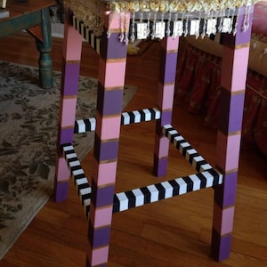 Whimsical hand painted bar stools made to order . You select your favorite colors and style of painting you wish. Chalk , whimsical