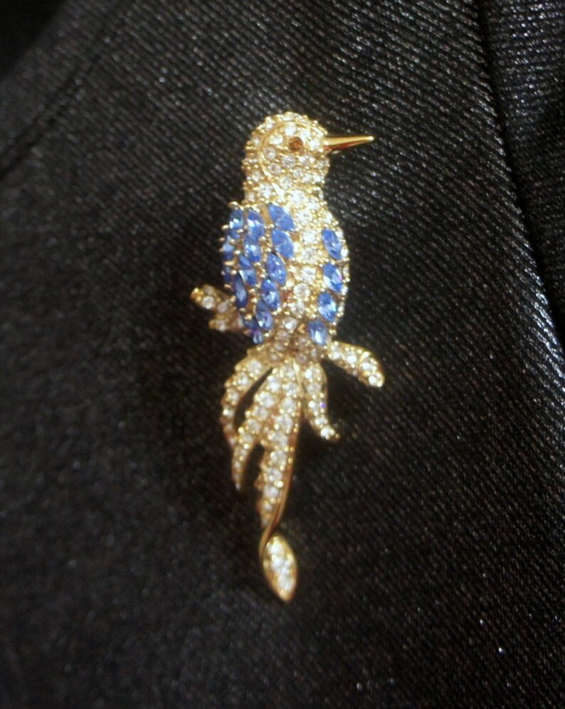 Vintage Nolan Miller signed Big Blue and White Bird gracefully sitting on Branch Rhinestones Brooch Pin ~