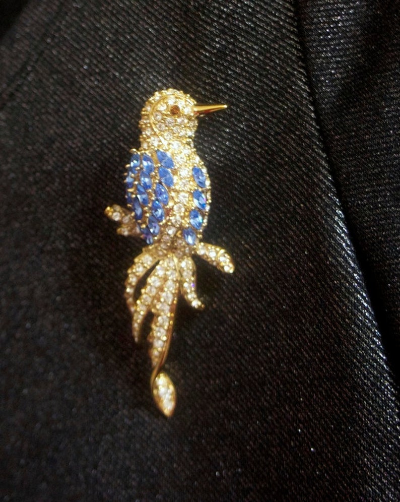 Vintage Nolan Miller signed Big Blue and White Bird gracefully sitting on Branch Rhinestones Brooch Pin ~