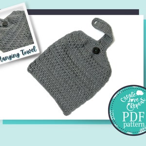 May include: Gray crocheted hanging towel with a button and loop. The towel is made with a textured stitch and has a simple design. The image includes the text "Hanging Towel" and "Create Love Repeat PDF pattern".