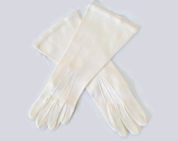 white cloth gloves
