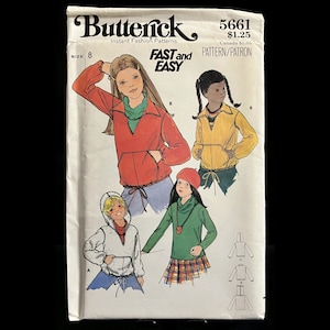 May include: A vintage sewing pattern for a pullover top with a V-neck and a kangaroo pocket. The pattern is from Butterick, pattern number 5661, and is labeled "Fast and Easy".