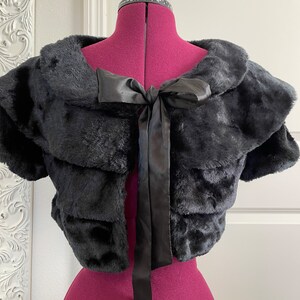 Small - 4 Tiered Soft Black Faux Fur Short Sleeved Jacket