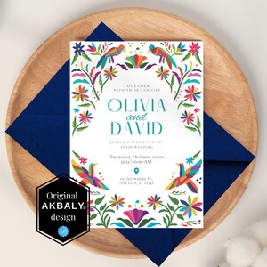 May include: A colorful wedding invitation with a white background featuring a floral design with birds and the text "Together with their families Olivia and David Joyfully invite you to their wedding Thursday, October 20th 2022 10:00 AM 123 Anywhere St., Any City, ST 12345"