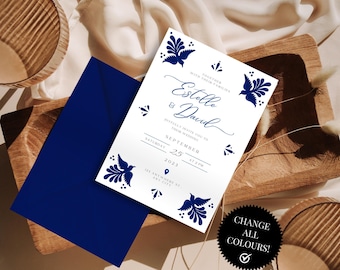 Puede incluir: Una invitación de boda blanca con diseños florales azules y el texto "Juntos con sus familias Estelle & David les invitan cordialmente a su boda Sábado, 25 de septiembre de 2023 a las 2:00 PM 123 Anywhere St. Any City"