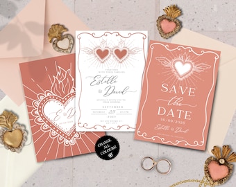 May include: Two wedding invitation cards with a save the date card. The cards feature a white heart with wings and a halo. The text on the cards reads "Together with their families Estelle & David" and "Save the Date 30/09/2025 Estelle & David".