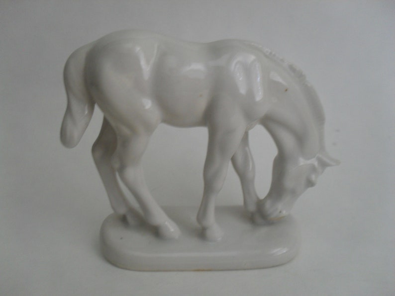 white porcelain horse statue