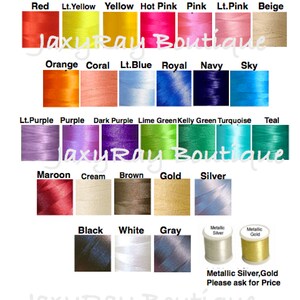 May include: A color chart of embroidery floss with a variety of colors, including red, yellow, blue, green, purple, brown, black, white, and gray. The chart is labeled with the color names and the text "JaxyRay Boutique".