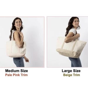 May include: A medium-sized canvas tote bag with pale pink trim and a large-sized canvas tote bag with beige trim. Both bags feature a rectangular structure, dual shoulder straps, and a reinforced base panel in their respective trim colours.