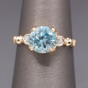 Sparkling Vintage Blue Zircon and Diamond Accent Ring in 14k Yellow Gold