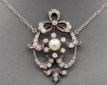 Exquisite Edwardian Natural Pearl and Diamond Bow Necklace in 14k White and Yellow Gold