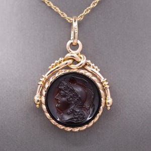 Antique Victorian Spinning Pressed Glass Cameo and Onyx Locket in 14k Rose Gold