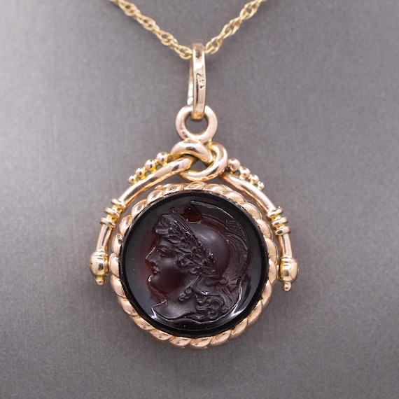 Antique Victorian Spinning Pressed Glass Cameo and Onyx Locket in 14k Rose Gold