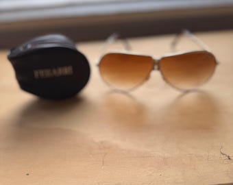 Vintage Ferrari Aviator-zonnebril met etui: gouden montuur en lens met bruine kleurverloop