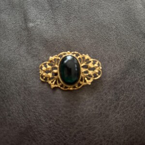 Vintage Gold-Tone Filigree Brooch With Green Glass Cabochon Oval Centerpiece