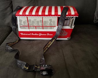 Universal Studios Glamour Tram Seau à pop-corn avec cordon réglable et chauffe-bois Woody Woodpecker