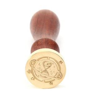 Joli sceau à cacheter pour faire un cachet de cire sur un emballage artisanal, une lettre personnalisée, un paquet cadeau...
