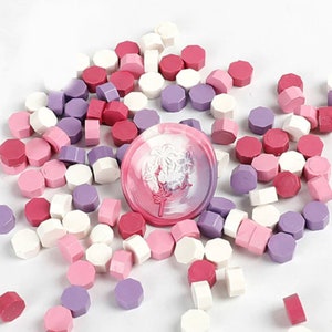 100 granulés de cire camaieu rose - Granulés de cire pour cachet de cire en camaieu sur enveloppe, faire-part, cadeau...