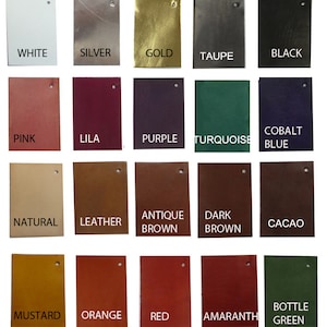 May include: A color chart of 20 different leather colors, including white, silver, gold, taupe, black, pink, lila, purple, turquoise, cobalt blue, natural, leather, antique brown, dark brown, cacao, mustard, orange, red, amaranth, and bottle green.
