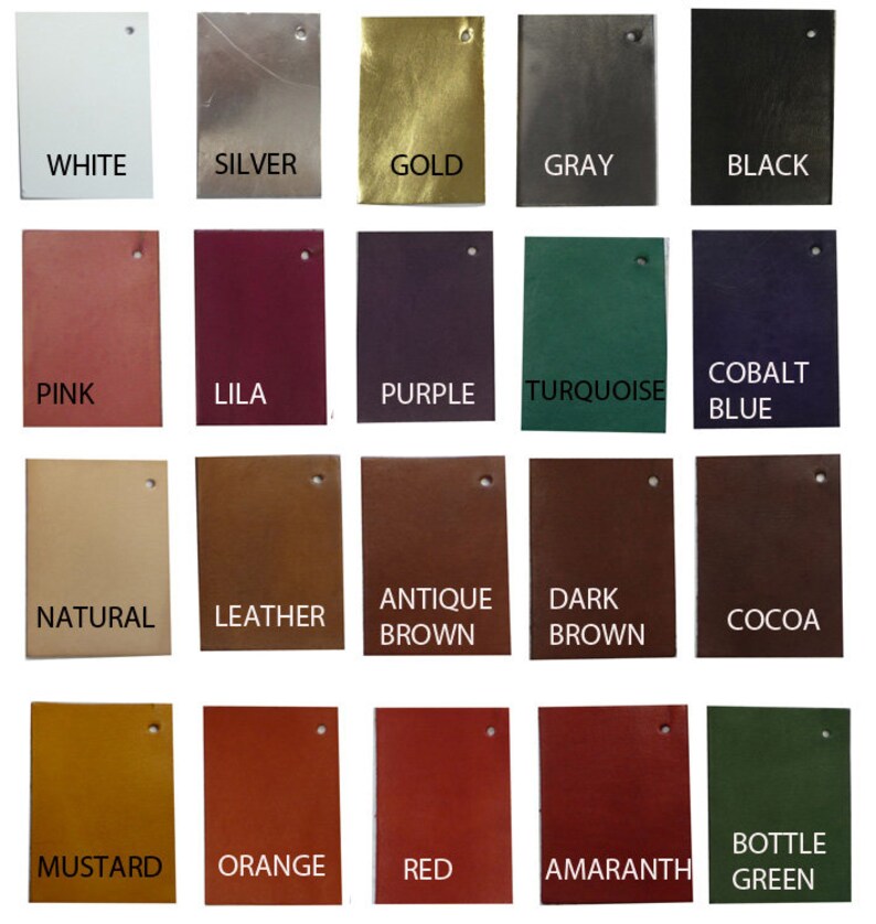 May include: A collection of rectangular leather swatches in various colors, including white, silver, gold, gray, and black. Additional colors include pink, lila, purple, turquoise, and cobalt blue. Other colors are natural, leather, antique brown, dark brown, cocoa, mustard, orange, red, amaranth, and bottle green.