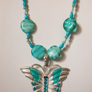 Butterfly Freedom 28" Necklace featuring Aqua swirl glass beads and Beautiful Butterfly Pendant - handmade in the U.S.