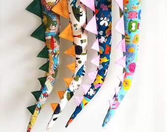 plush dinosaur tails