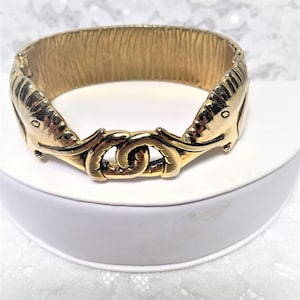 Elephant Cuff Bracelet in Gold Tone, Opens at Side, Elephants with Entwined Trunks, For the Elephant Collector and Nature Lover.