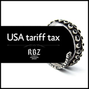 May include: A silver ring featuring an octopus tentacle design. The ring has a textured surface with small, round suckers. The text "USA tariff tax" is displayed on a black background, along with the "RBZ UNRESTRAINED JEWELRY" logo.