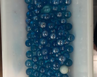 Blue Glass Marbles with manganese glow