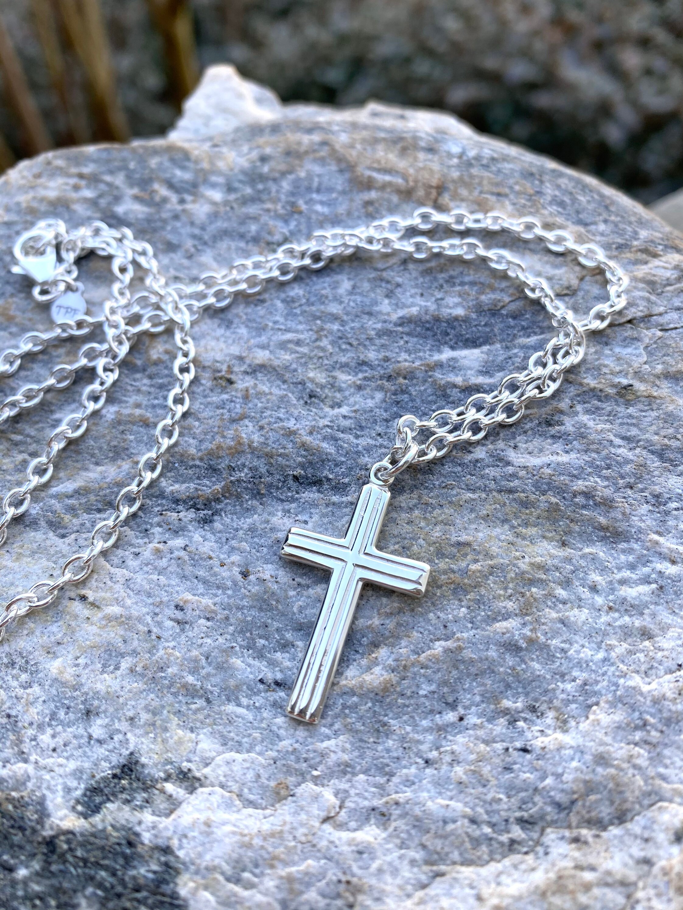 Young mens cross best sale necklace