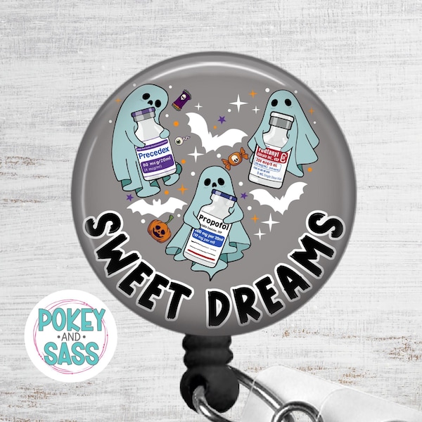 May include: A circular badge reel featuring a gray background with three light blue ghosts holding medical vials labeled Precedex, Fentanyl, and Propofol. The design includes small bats, a pumpkin, and candy, with the text SWEET DREAMS in black.