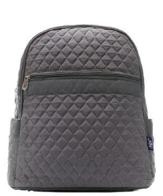 grey quilted backpack