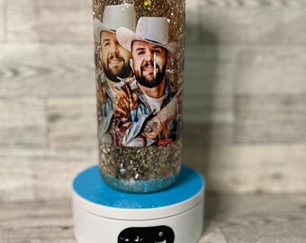 Bola de nieve en lata de vidrio de 16 oz