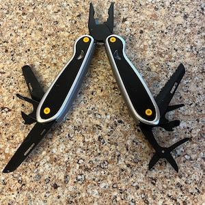 Folding Multi-Tool — 9 Tools in One with Case