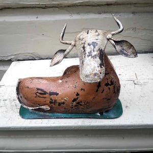 Antique Distressed Welded Hand Painted Metal Reclining Brahma Bull Sculpture