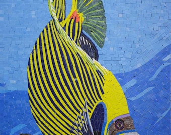 May include: A yellow and blue mosaic fish with black stripes swimming in a blue mosaic background. The fish has a large, round eye and a small mouth.
