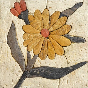 May include: A stone mosaic tile featuring a stylized flower with yellow petals and a red center. The flower is surrounded by brown and gray leaves.