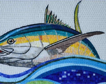May include: A mosaic tile art piece depicting a yellow, blue, and white fish jumping out of the water. The water is represented by blue, green, and white tiles.