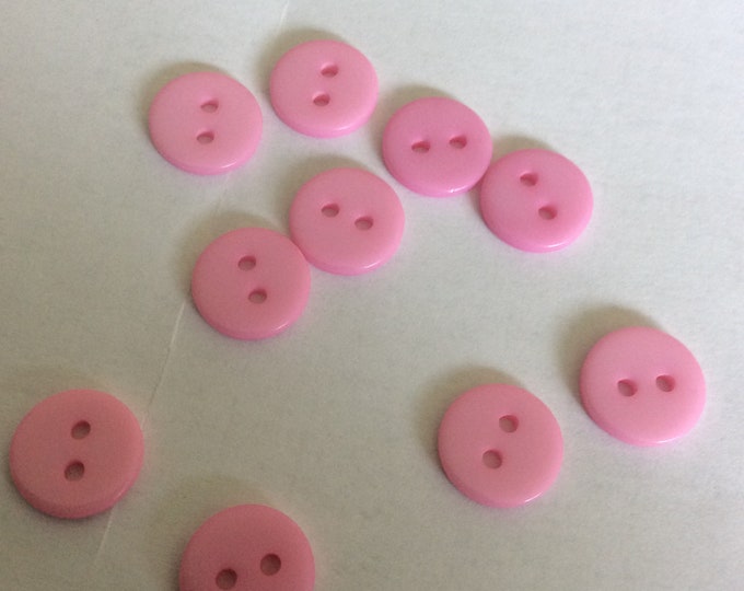 Pack 10 ,  pink plastic  11 mm , 2 hole  buttons Freepost U.K.h