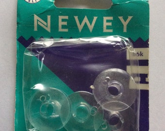 Neweys ,  clear plastic bobbins , pk 4, 66k, Freepost U.K.