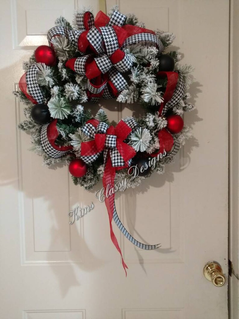 Wreath pine snow flocked red black white ribbon bow ornaments winter holiday door decor
