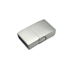 May include: Silver magnetic clasp for jewelry making. The clasp is rectangular and has a brushed finish.