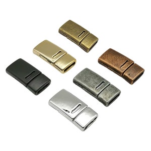 May include: Six magnetic clasps for jewellery making in various finishes: black, gold, silver, antique brass, antique copper, and antique silver.